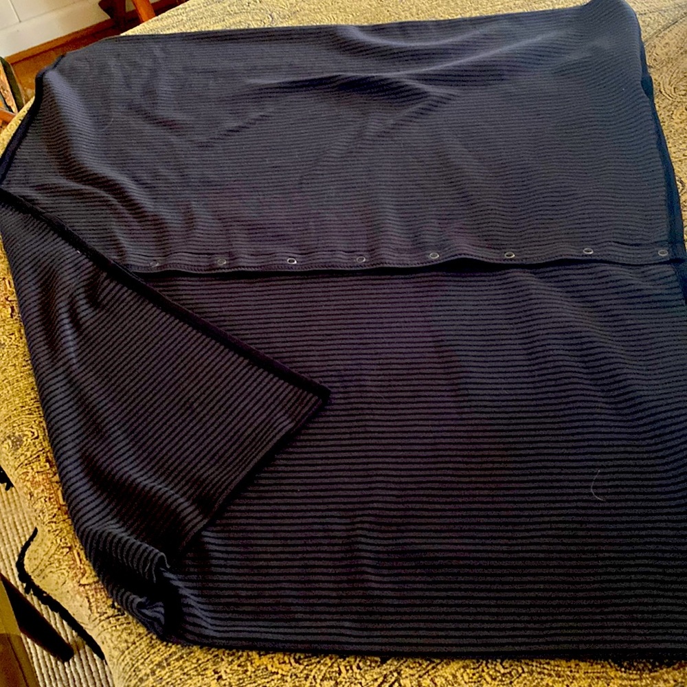 Lulu lemon warmer or shawl worn 6 ways.  Good as a comfort support also.